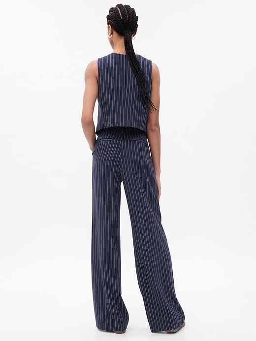 2 of 8 showing, with the color navy blue pinstripe of product High Rise Pleated Wide-Leg Trousers