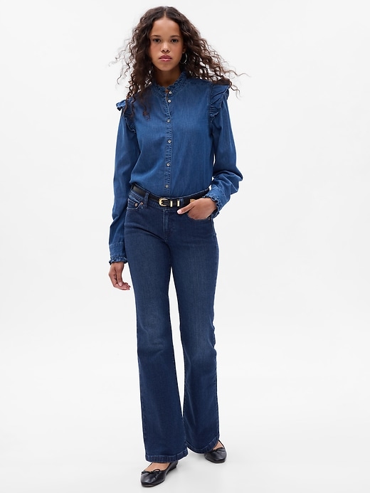 1 of 8 showing, with the color dark indigo of product Low Rise '70s Flare Jeans
