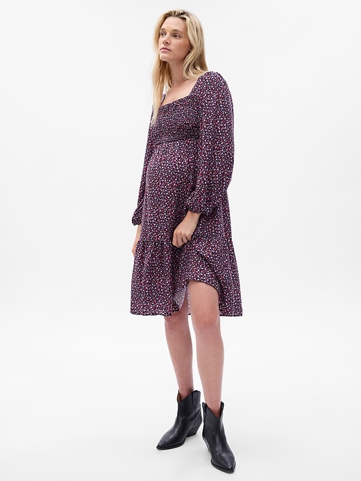 1 of 8 showing, with the color red & purple floral of product Maternity Smocked Midi Dress