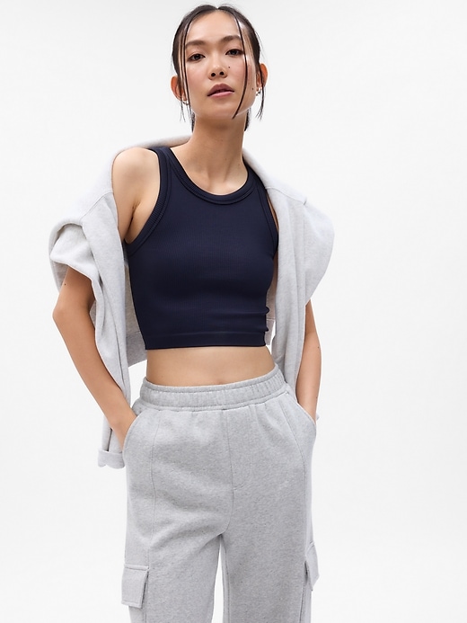 1 of 8 showing, with the color navy blue of product GapFit Seamless Rib Crop Halter Tank Top