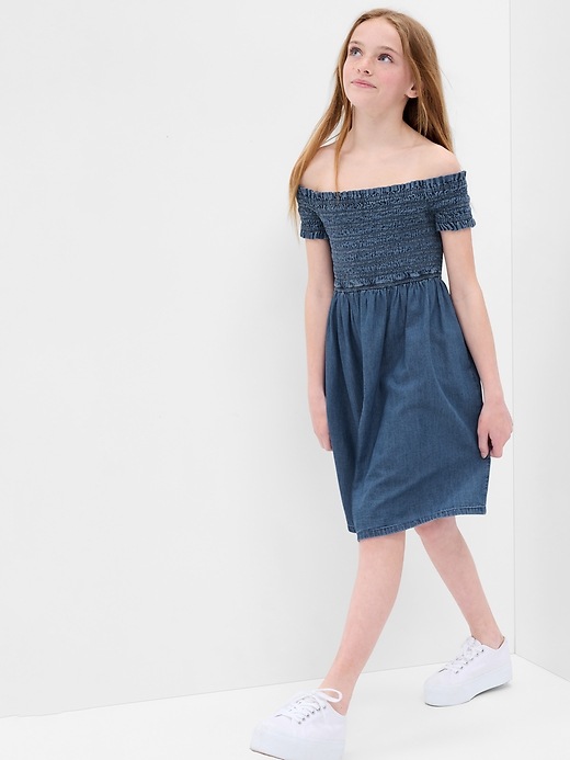 1 of 8 showing, with the color medium wash of product Kids Smocked Denim Dress