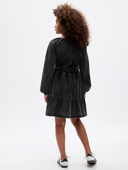 2 of 8 showing, with the color black wash of product Kids Smocked Denim Dress