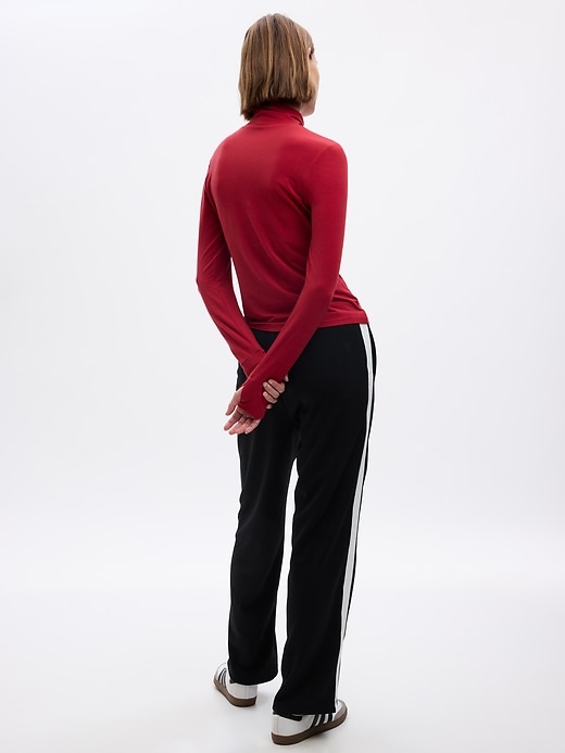 2 of 8 showing, with the color sled red of product GapFit Breathe Turtleneck T-Shirt
