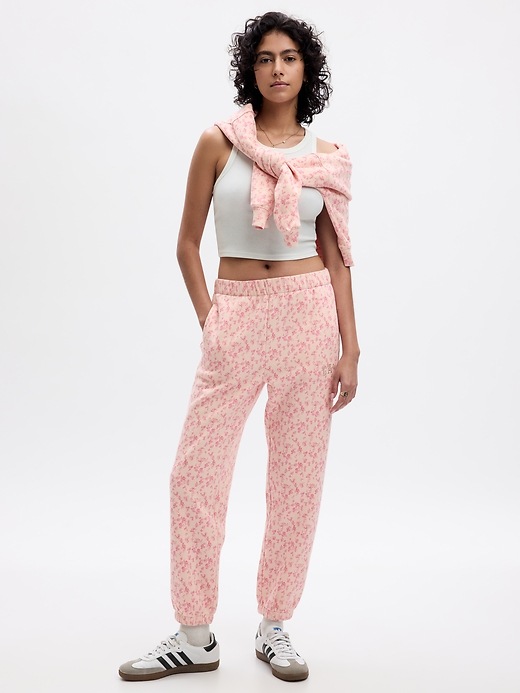 1 of 8 showing, with the color pink floral of product Gap × LoveShackFancy Floral Joggers