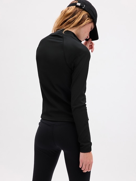 2 of 8 showing, with the color BLACK of product GapFit Studio Rib Quarter-Zip Top