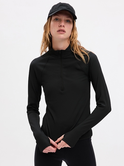 1 of 8 showing, with the color BLACK of product GapFit Studio Rib Quarter-Zip Top