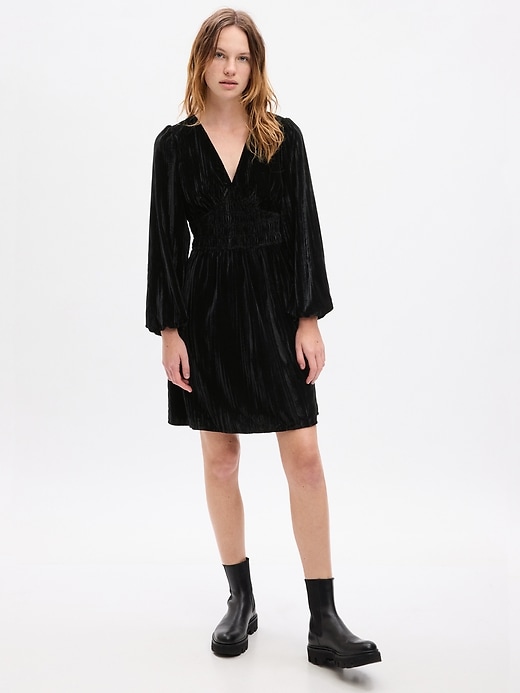 1 of 8 showing, with the color black of product Velvet Smocked Mini Dress