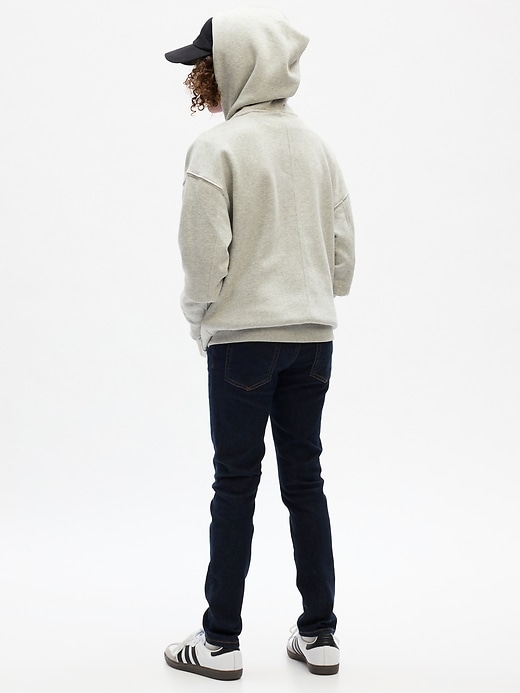 2 of 8 showing, with the color rinse washed indigo of product Kids Skinny Jeans