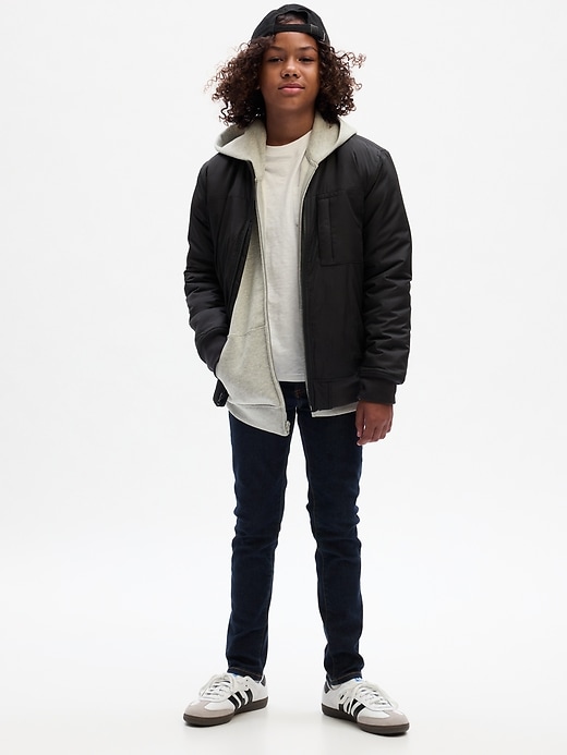 1 of 8 showing, with the color rinse washed indigo of product Kids Skinny Jeans