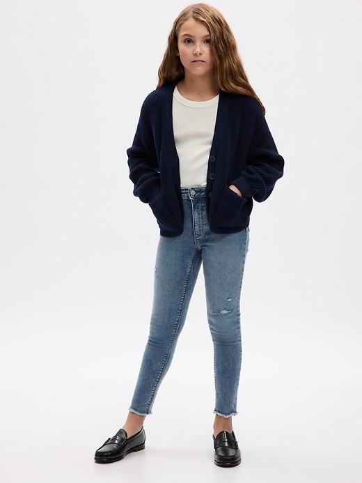 1 of 8 showing, with the color medium wash of product Kids High Rise Distressed Ankle Jeggings