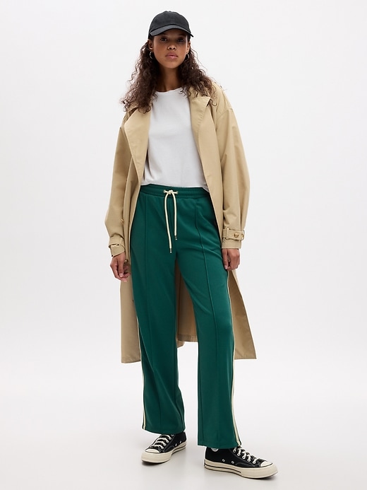 1 of 8 showing, with the color velvet teal green of product High-Rise Track Pants