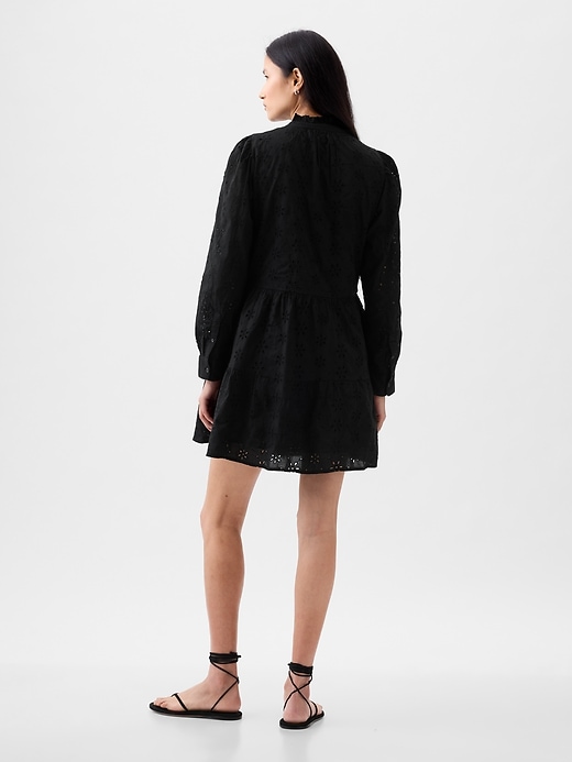 2 of 8 showing, with the color BLACK of product Eyelet Tiered Mini Shirtdress