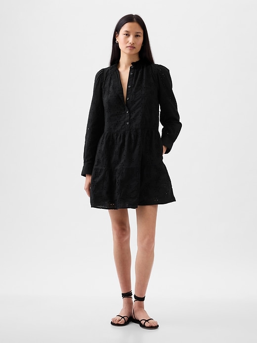 1 of 8 showing, with the color BLACK of product Eyelet Tiered Mini Shirtdress