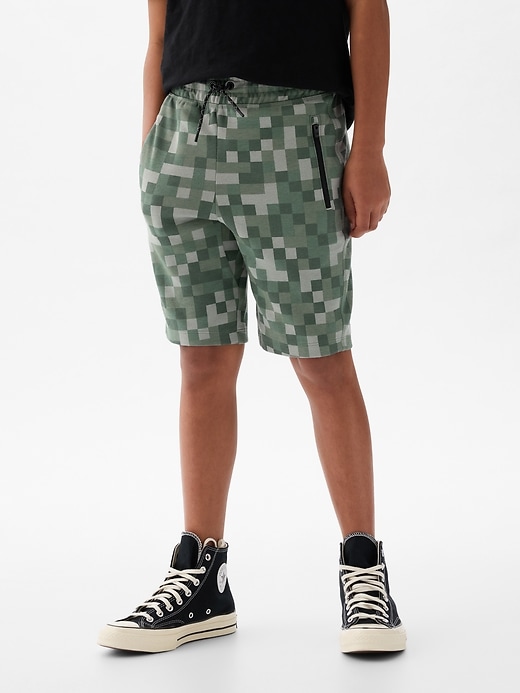 1 of 8 showing, with the color green print of product Kids GapFit 7" Fit Tech Shorts
