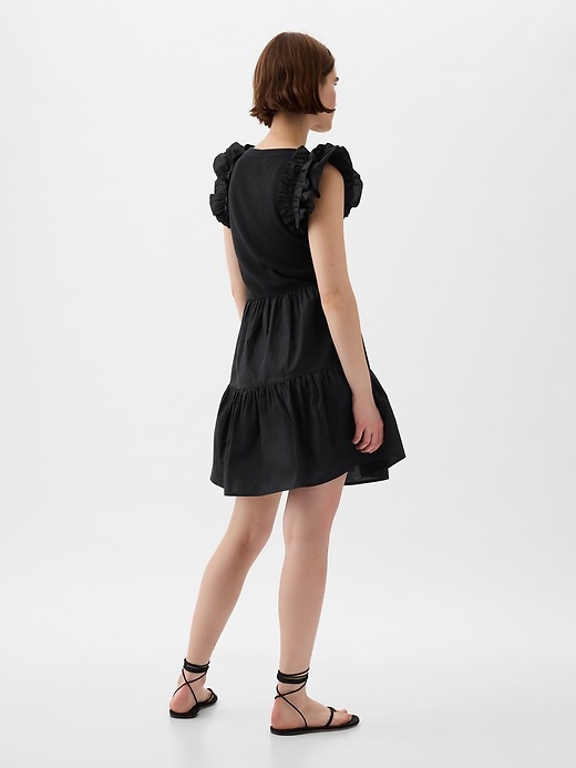 2 of 8 showing, with the color black of product Ruffle Sleeve Tiered Mini Dress