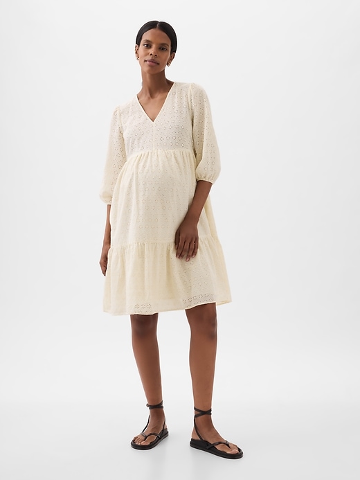 1 of 8 showing, with the color chino beige of product Maternity Eyelet Tiered Mini Dress