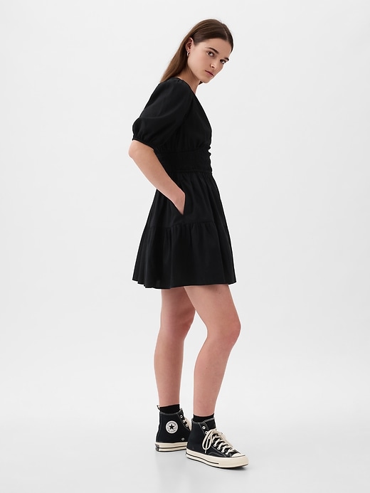 Image number 9 showing, Puff Sleeve Smocked Mini Dress