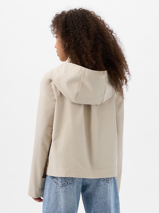 2 of 8 showing, with the color bedrock khaki of product Kids Cropped Trench Coat