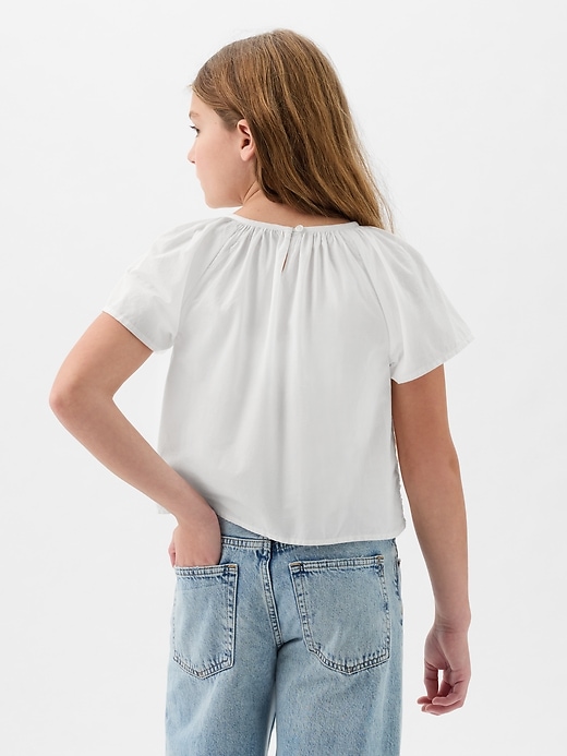 2 of 8 showing, with the color optic white of product Kids Eyelet Flutter Shirt