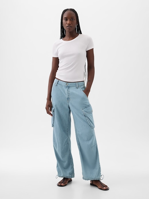 1 of 8 showing, with the color light indigo of product Mid Rise Wide Baggy Cargo Jeans