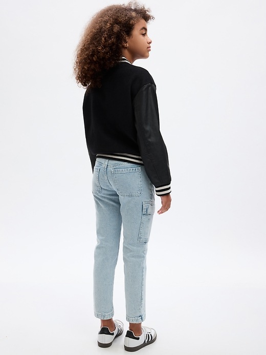 2 of 8 showing, with the color medium wash of product Kids High Rise Girlfriend Cargo Jeans
