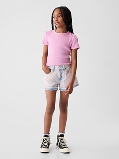 Girl in pink shorts shop