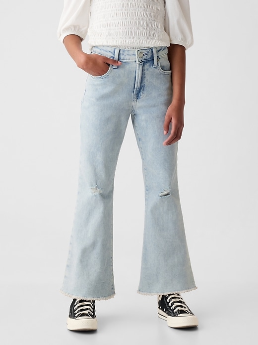 2 of 8 showing, with the color medium wash of product Kids High Rise '70s Flare Ankle Jeans