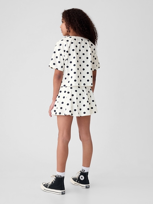2 of 8 showing, with the color navy dots of product Kids Skort Outfit Set