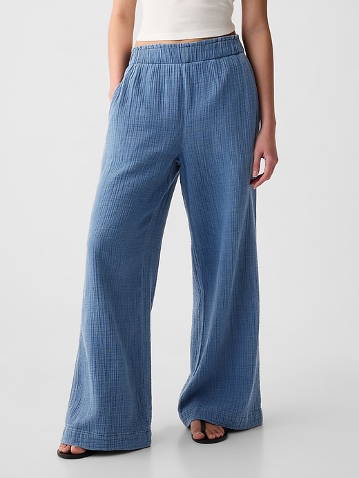 2 of 8 showing, with the color blue denim wash of product High Rise Crinkle Gauze Wide-Leg Pants