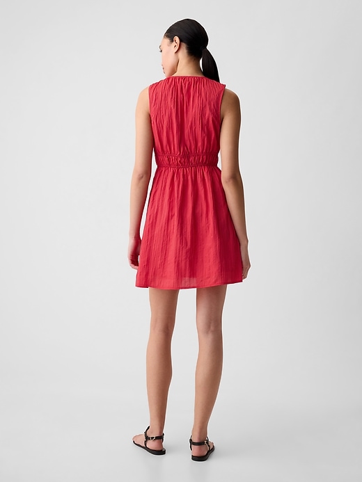 2 of 8 showing, with the color slipper red of product Textured Crinkle Empire Waist Mini Dress