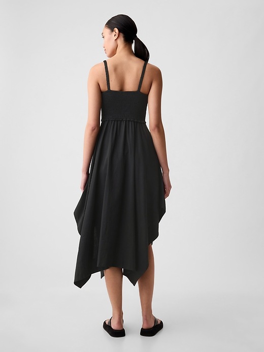 2 of 8 showing, with the color black of product Smocked Handkerchief Hem Midi Dress