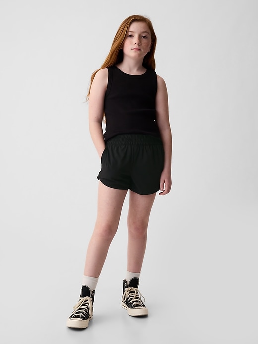 1 of 8 showing, with the color black of product Kids Running Shorts