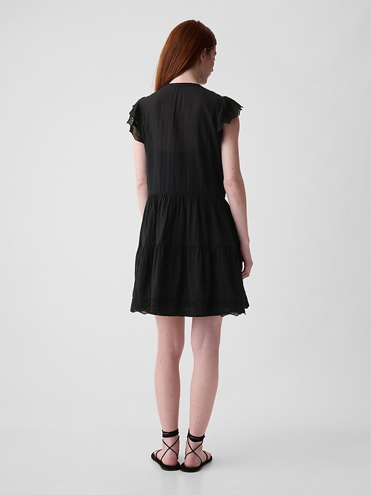 2 of 8 showing, with the color black of product Textured Crinkle Crochet Mini Dress