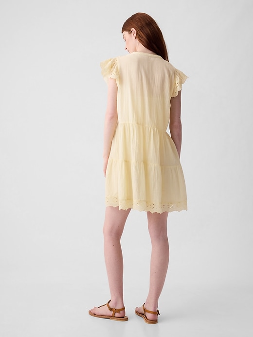 2 of 8 showing, with the color maize yellow of product Textured Crinkle Crochet Mini Dress