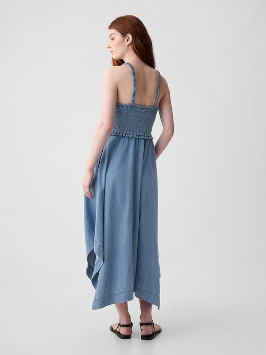 2 of 8 showing, with the color medium indigo of product Denim Handkerchief Hem Midi Dress