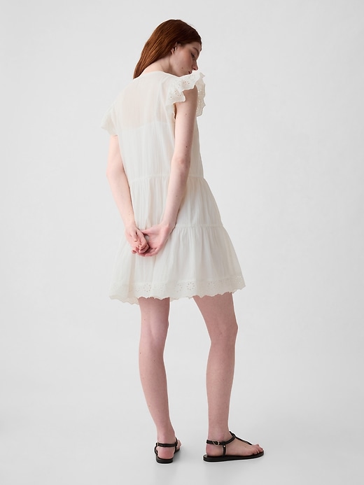 2 of 8 showing, with the color new off white of product Textured Crinkle Crochet Mini Dress