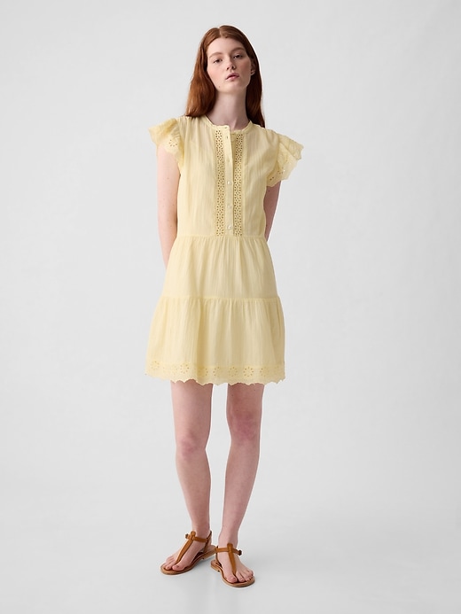 1 of 8 showing, with the color maize yellow of product Textured Crinkle Crochet Mini Dress