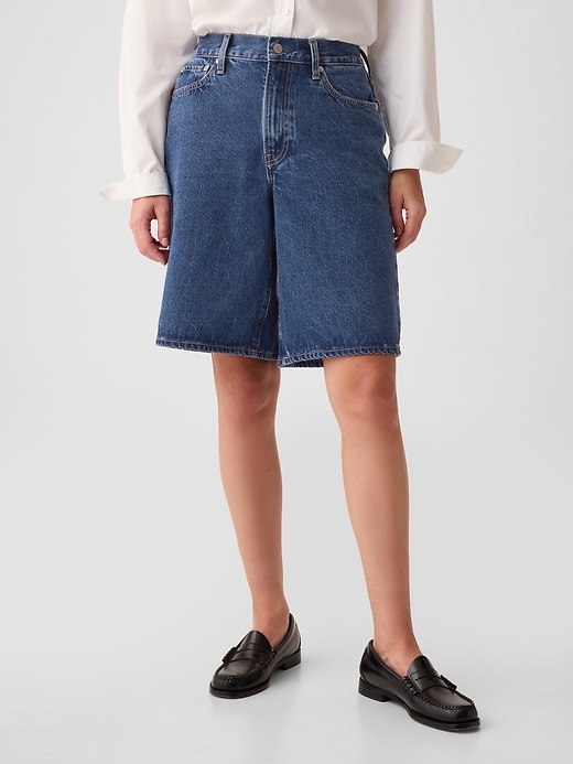 2 of 8 showing, with the color medium indigo of product 11.5" Mid Rise Longline Denim Shorts
