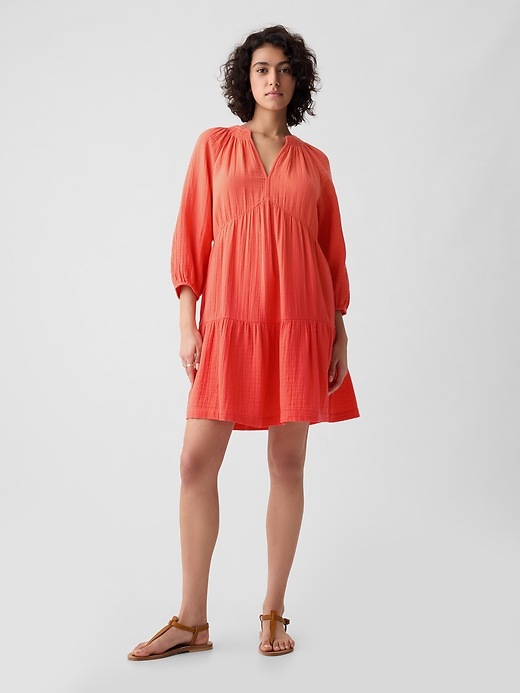 1 of 8 showing, with the color fire coral red of product Crinkle Gauze Tiered Mini Dress