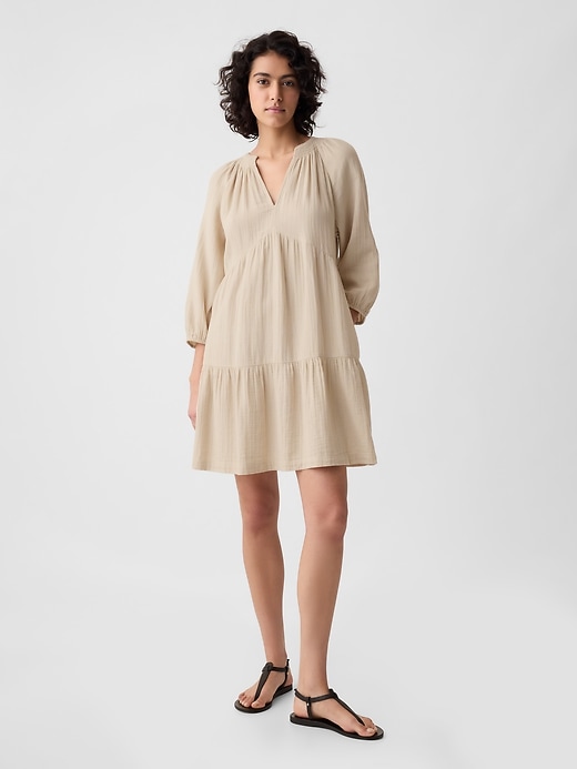 1 of 8 showing, with the color bedrock beige of product Crinkle Gauze Tiered Mini Dress