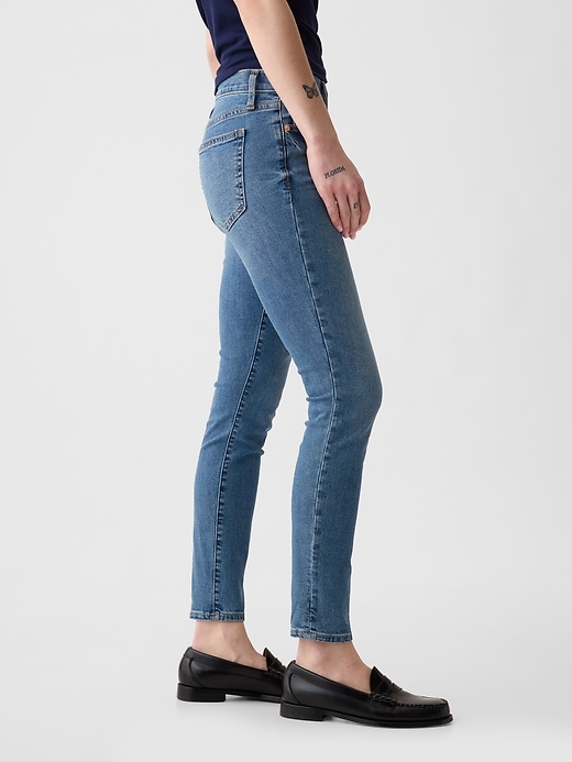 Image number 8 showing, Mid Rise True Skinny Jeans
