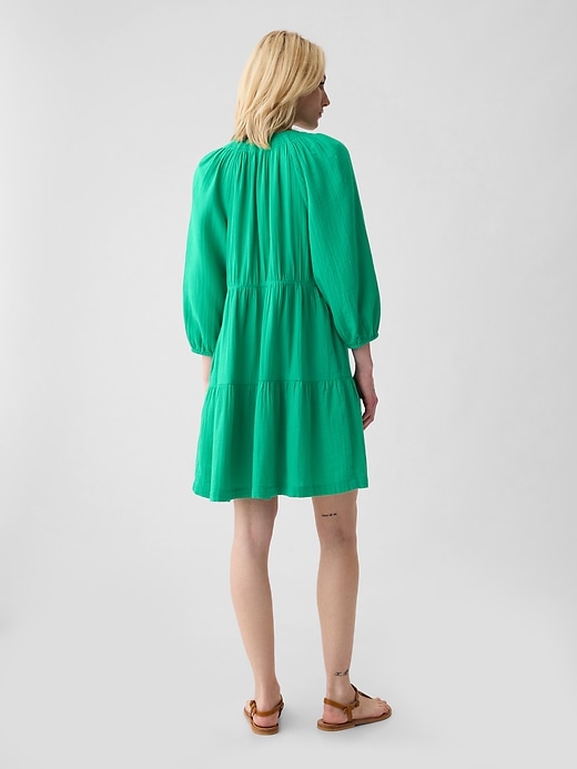 2 of 8 showing, with the color simply green of product Crinkle Gauze Tiered Mini Dress