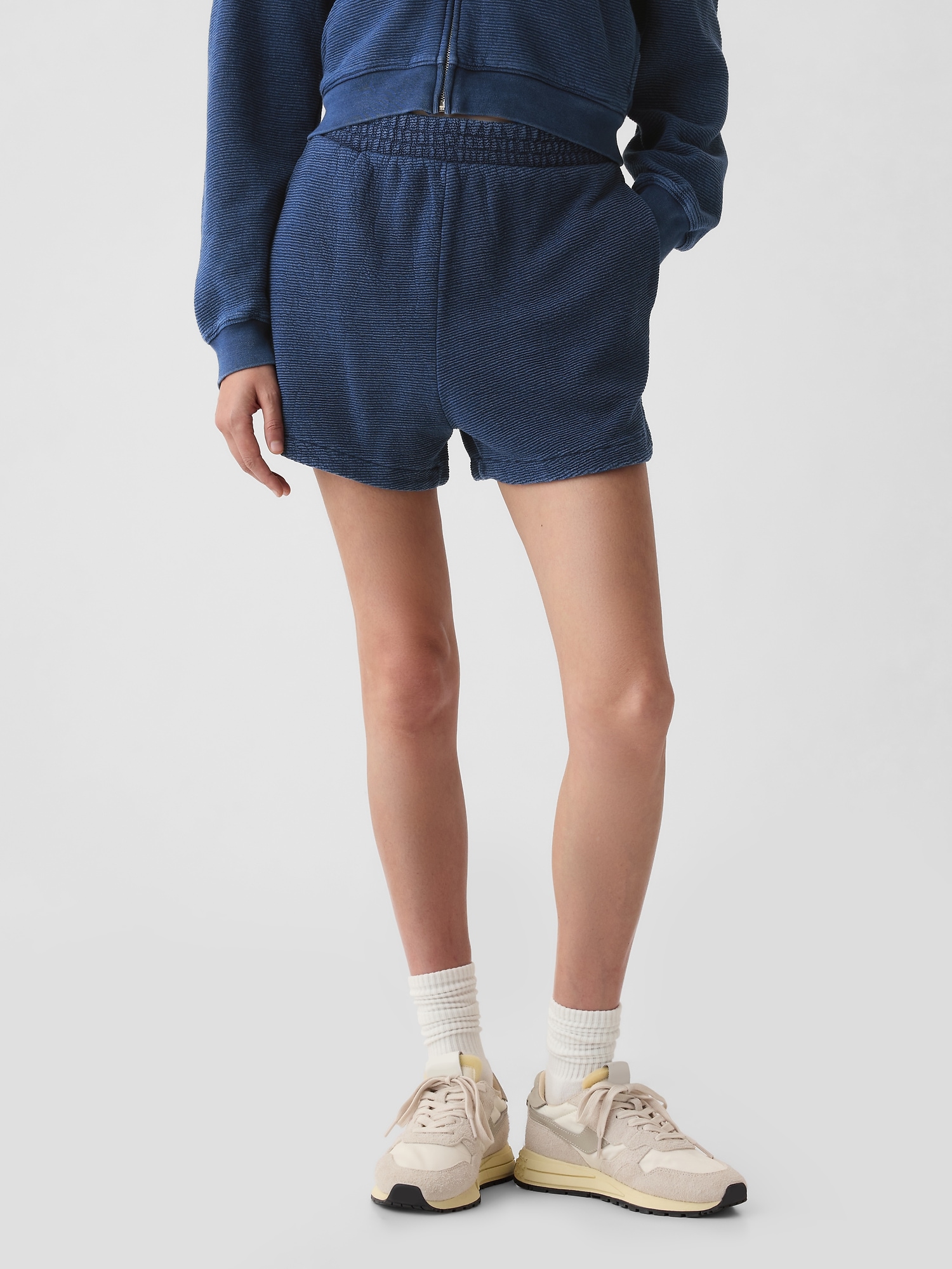 Shop Gap Textured Dolphin Sweat Shorts In Medium Blue Indigo