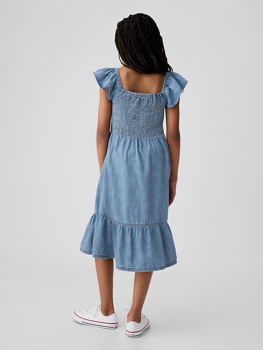 2 of 8 showing, with the color medium wash of product Kids Smocked Midi Dress