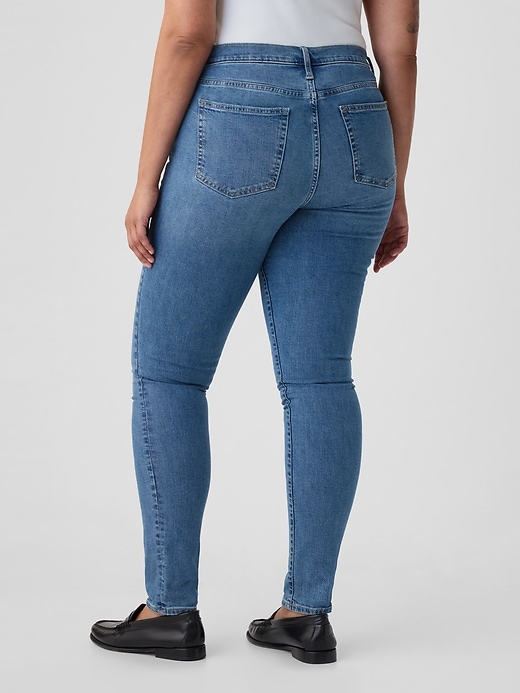 Image number 6 showing, Mid Rise True Skinny Jeans