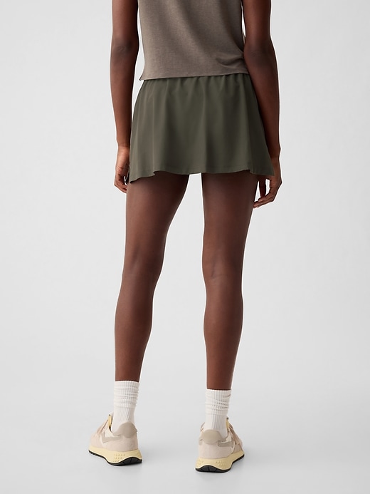 2 of 8 showing, with the color greenish grey of product GapFit Sky High Rise Runaround Exercise Skort