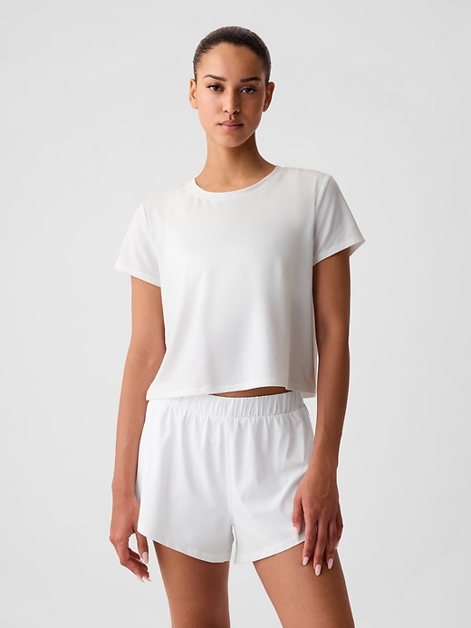 1 of 8 showing, with the color white of product GapFit Breathe Cropped Shirt