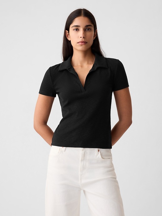 1 of 8 showing, with the color black of product Essential Rib Polo Shirt