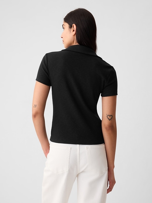 2 of 8 showing, with the color black of product Essential Rib Polo Shirt