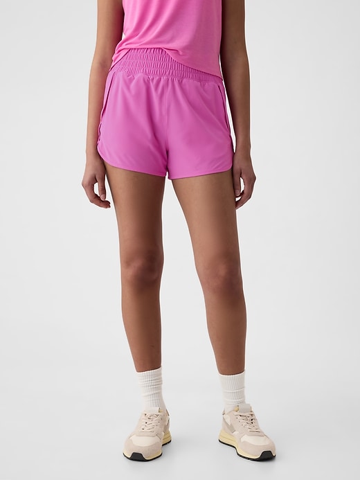 1 of 8 showing, with the color budding pink lilac of product GapFit High Rise Running Shorts